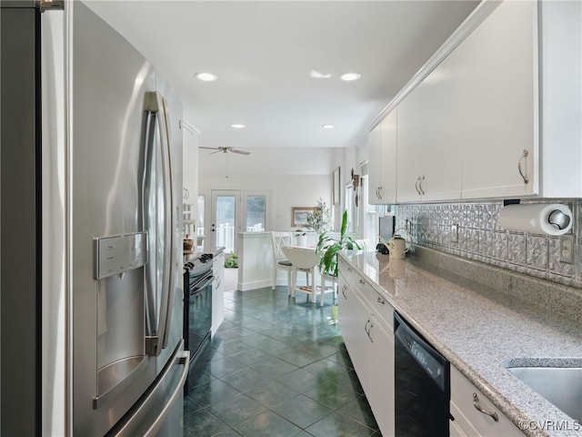 12503 Winchester Green Ct, Henrico, VA 23233 - kitchen featuring black appliances, tasteful backsplash, white cabinetry, dark tile patterned flooring, and recessed lighting