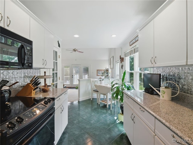 12503 Winchester Green Ct, Henrico, VA 23233 - kitchen with black appliances, white cabinets, dark tile patterned flooring, a ceiling fan, and recessed lighting