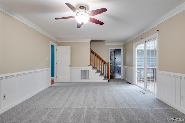 1301 Wesanne Ln, Midlothian, VA 23114 - carpeted spare room with stairway, a wainscoted wall, a ceiling fan, ornamental molding, and a decorative wall