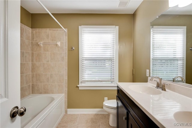 1301 Wesanne Ln, Midlothian, VA 23114 - bathroom featuring double vanity, toilet, tile patterned floors, bathtub / shower combination, and baseboards