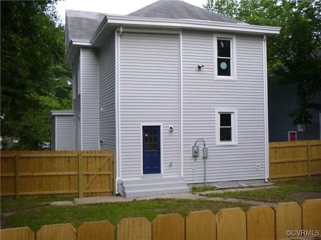 3210 3rd Ave, Richmond, VA 23222 - back of property featuring entry steps and roof with shingles