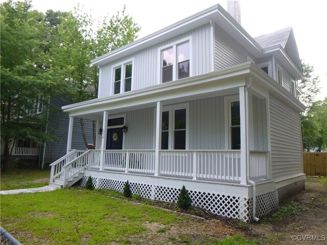 3210 3rd Ave, Richmond, VA 23222 - farmhouse inspired home with covered porch and a chimney
