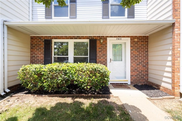 8406 Shannon Green Ct, Henrico, VA 23228 - doorway to property with brick siding and a porch