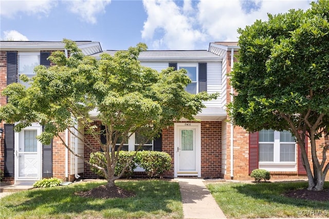 8406 Shannon Green Ct, Henrico, VA 23228 - view of property hidden behind natural elements featuring brick siding