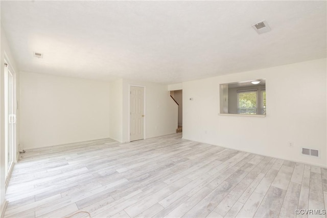 8406 Shannon Green Ct, Henrico, VA 23228 - empty room with light wood finished floors and stairs