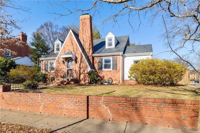 4100 Patterson Ave, Richmond, VA 23221 - view of front of house with a chimney, brick siding, and a front lawn