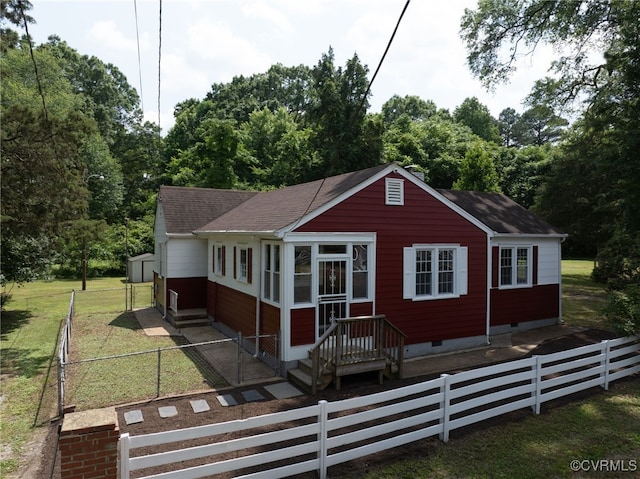 6610 St George St, Chesterfield, VA 23237 - view of front facade featuring crawl space, a shingled roof, and a gate
