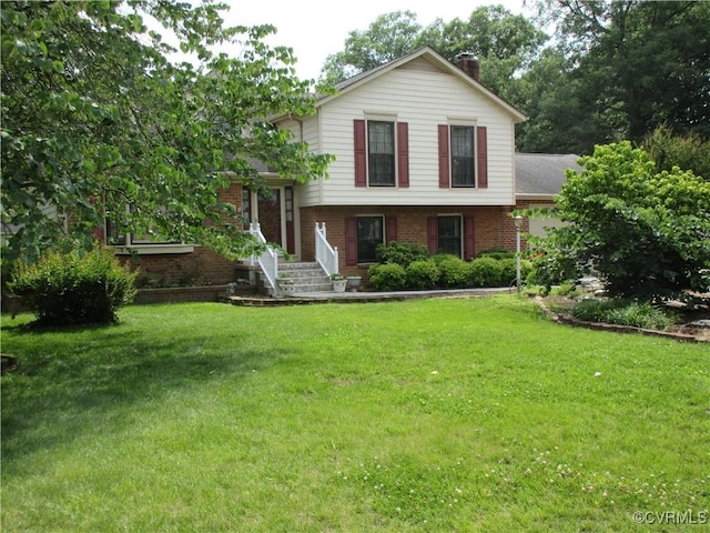 2803 Cannon Rd, Glen Allen, VA 23060 - tri-level home with brick siding, a chimney, and a front lawn
