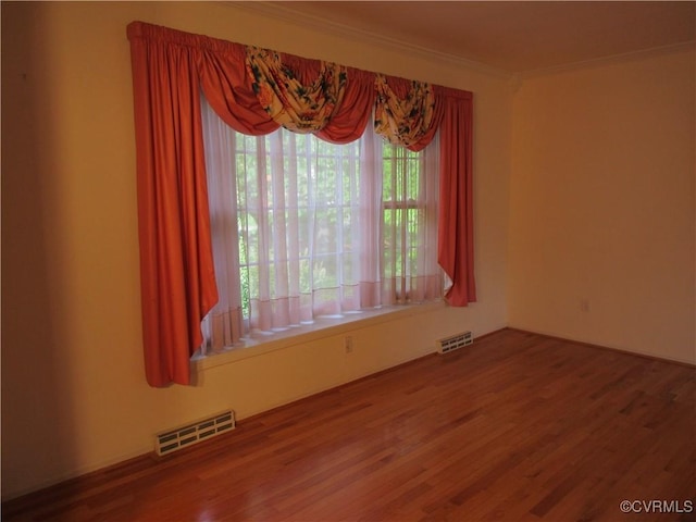 2803 Cannon Rd, Glen Allen, VA 23060 - spare room featuring ornamental molding and wood finished floors