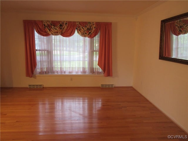 2803 Cannon Rd, Glen Allen, VA 23060 - empty room with wood finished floors and crown molding