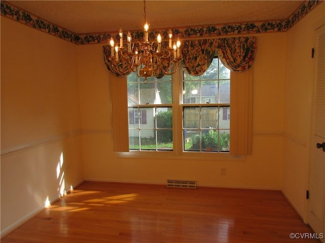2803 Cannon Rd, Glen Allen, VA 23060 - empty room featuring a chandelier and wood finished floors