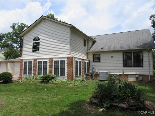 2803 Cannon Rd, Glen Allen, VA 23060 - rear view of house with a lawn, brick siding, and a shingled roof