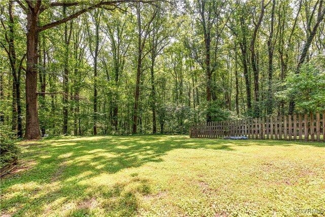 31 Pleasant Run, Cartersville, VA 23027 - view of yard with a wooded view