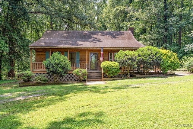 31 Pleasant Run, Cartersville, VA 23027 - view of front facade with a porch, a front lawn, a chimney, and roof with shingles