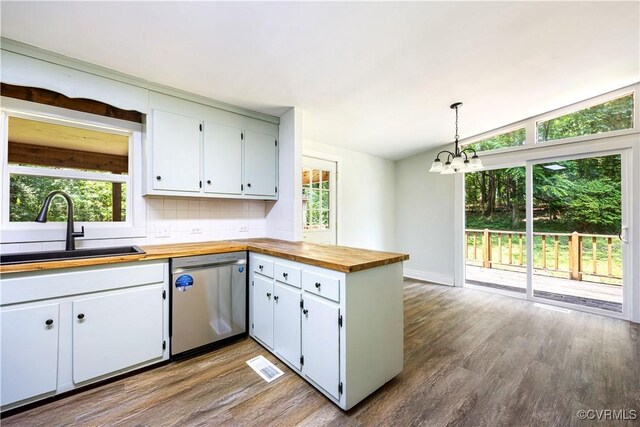 31 Pleasant Run, Cartersville, VA 23027 - kitchen with stainless steel dishwasher, butcher block countertops, wood finished floors, a chandelier, and lofted ceiling