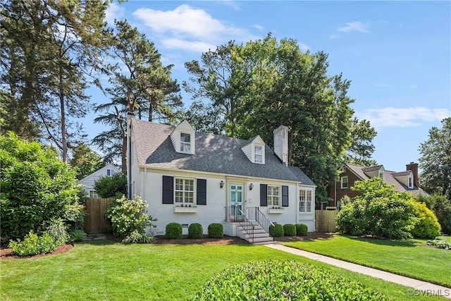 6502 W Franklin St, Henrico, VA 23226 - cape cod-style house featuring a chimney and roof with shingles