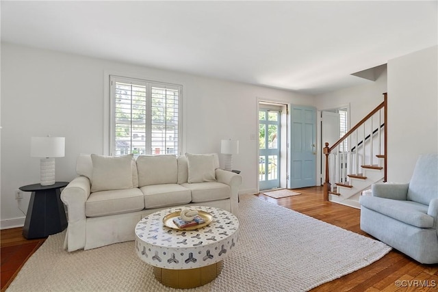 6502 W Franklin St, Henrico, VA 23226 - living room featuring wood finished floors and stairway