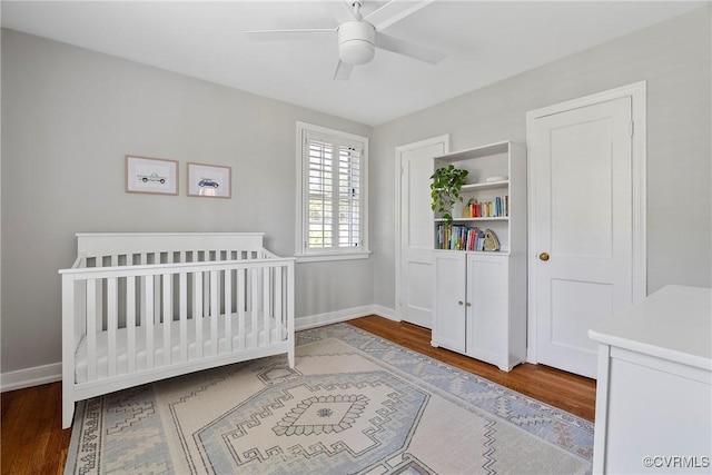 6502 W Franklin St, Henrico, VA 23226 - bedroom featuring wood finished floors, a nursery area, and ceiling fan