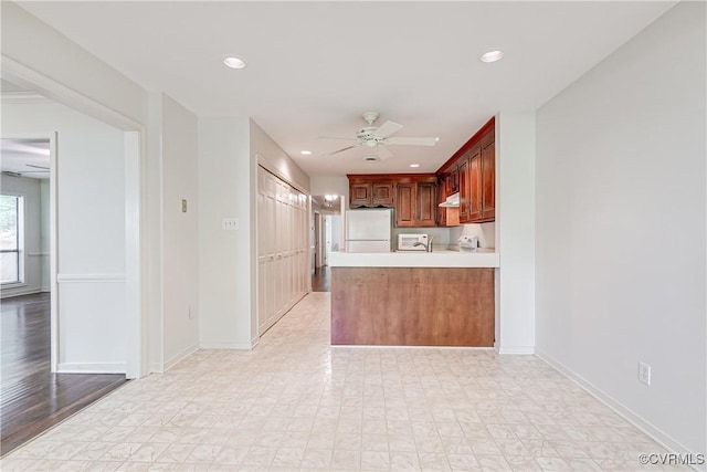 13542 Heathbrook Ter, Midlothian, VA 23112 - kitchen with white appliances, a ceiling fan, light countertops, recessed lighting, and a peninsula