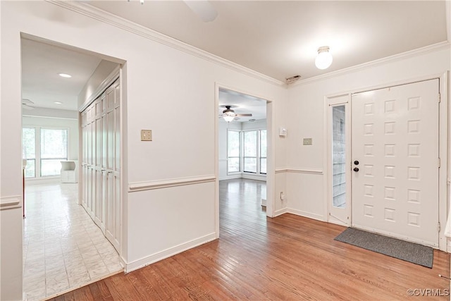 13542 Heathbrook Ter, Midlothian, VA 23112 - foyer entrance with ceiling fan, healthy amount of natural light, light wood finished floors, and crown molding