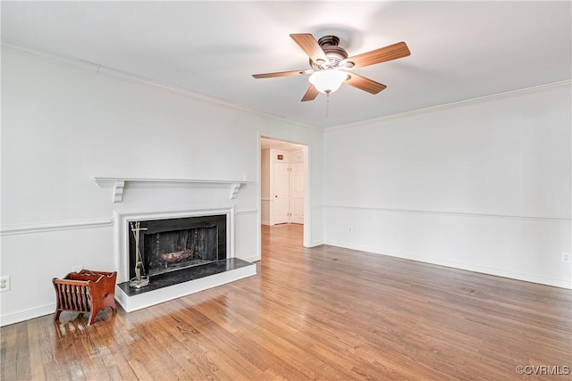 13542 Heathbrook Ter, Midlothian, VA 23112 - living area featuring wood finished floors, a fireplace with raised hearth, a ceiling fan, and crown molding