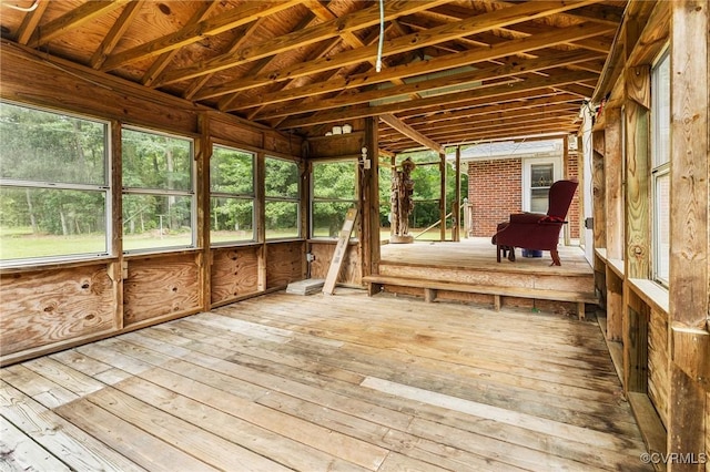 12418 Gravelbrook Rd, South Prince George, VA 23805 - unfurnished sunroom featuring healthy amount of natural light, a wooden deck, and wood-type flooring