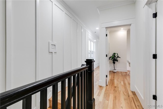 11 W 29th St, Richmond, VA 23225 - corridor featuring light wood-style floors and an upstairs landing