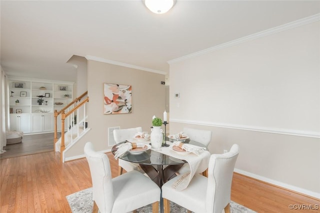 206 Michaux Crossing Ln, Chesterfield, VA 23113 - dining space with stairway, wood finished floors, and crown molding