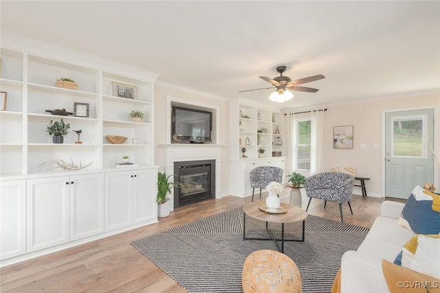 206 Michaux Crossing Ln, Chesterfield, VA 23113 - living area featuring ceiling fan, a glass covered fireplace, light wood-style floors, and ornamental molding