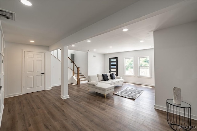 833 Wilcox St, Petersburg, VA 23803 - living room featuring dark wood-style floors, stairway, and recessed lighting