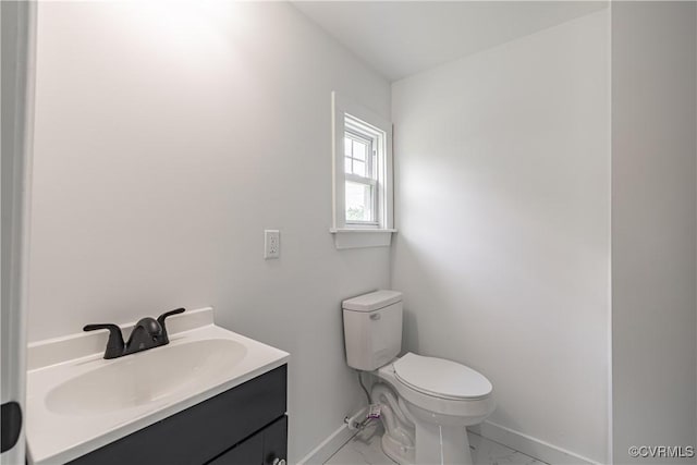 833 Wilcox St, Petersburg, VA 23803 - half bathroom with vanity and marble look tile flooring