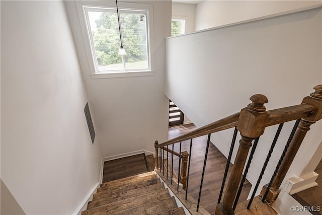 833 Wilcox St, Petersburg, VA 23803 - staircase with wood finished floors and baseboards