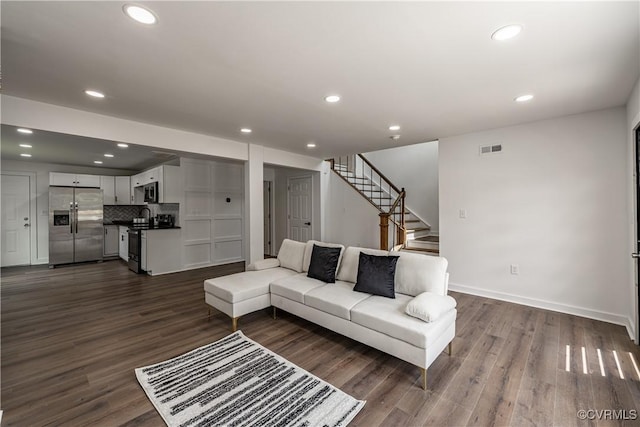 833 Wilcox St, Petersburg, VA 23803 - living area with stairway, dark wood-type flooring, and recessed lighting
