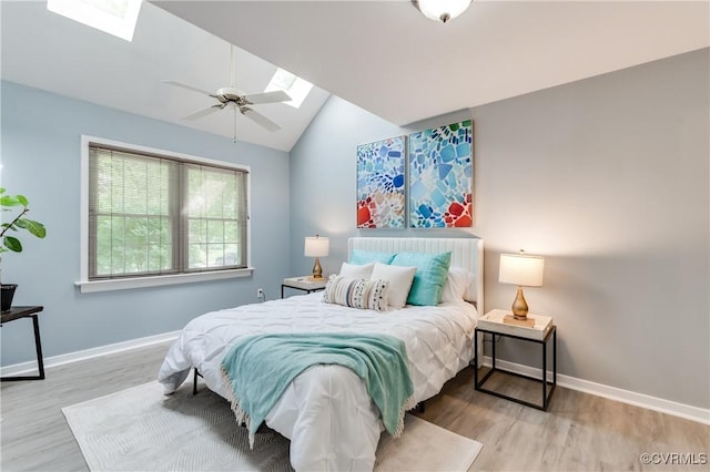 2103 Waters Mill Pt, North Chesterfield, VA 23235 - bedroom featuring a skylight, lofted ceiling, wood finished floors, and ceiling fan