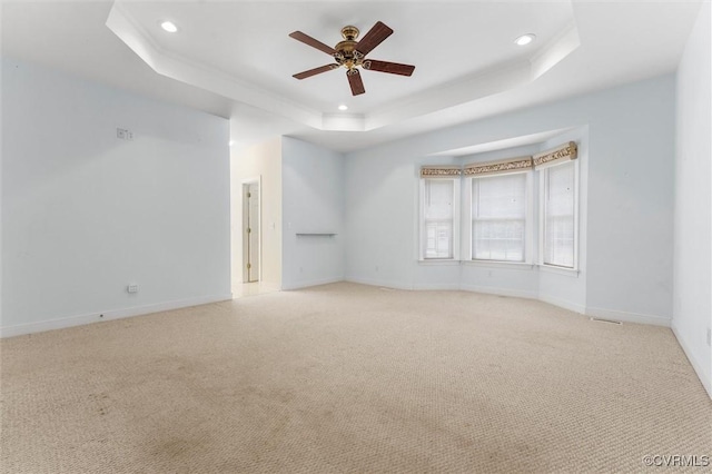 13531 Butlers Rd, Amelia Courthouse, VA 23002 - spare room with a raised ceiling, a ceiling fan, recessed lighting, and light carpet
