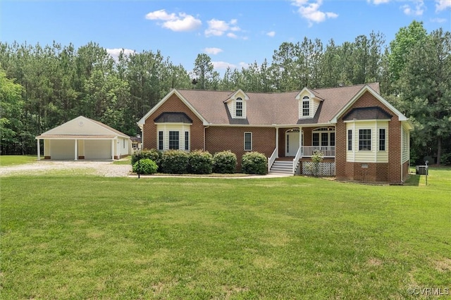 13531 Butlers Rd, Amelia Courthouse, VA 23002 - view of front of property with covered porch, a detached garage, an outdoor structure, a front lawn, and brick siding