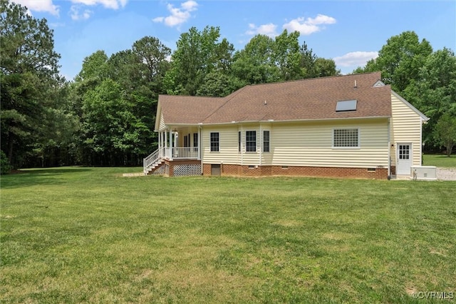 13531 Butlers Rd, Amelia Courthouse, VA 23002 - back of house featuring crawl space, a yard, covered porch, and roof with shingles