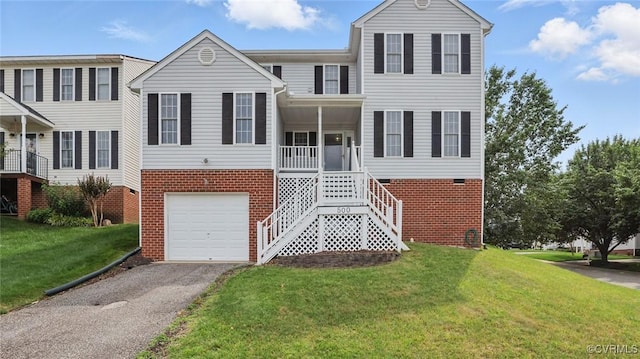 500 Village Gate Dr, Midlothian, VA 23114 - view of front of property with brick siding, stairs, asphalt driveway, and a front yard