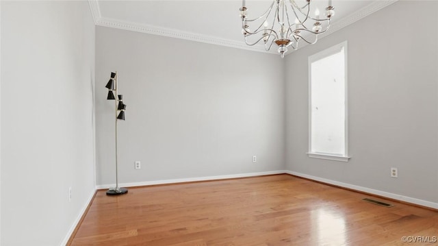 500 Village Gate Dr, Midlothian, VA 23114 - empty room with crown molding, a chandelier, and wood finished floors
