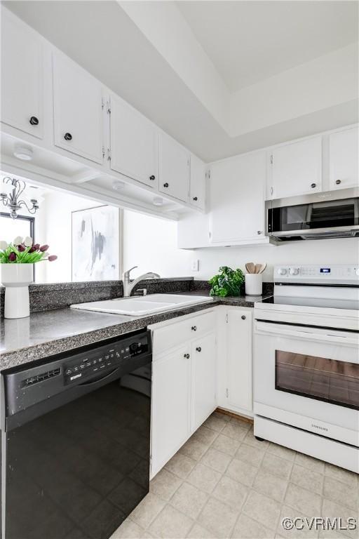 4814 Long Shadow Dr, Chesterfield, VA 23112 - kitchen featuring electric range, black dishwasher, stainless steel microwave, and white cabinetry
