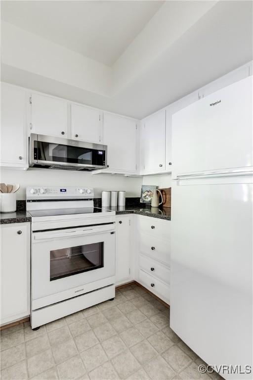 4814 Long Shadow Dr, Chesterfield, VA 23112 - kitchen with white appliances, dark countertops, and white cabinetry