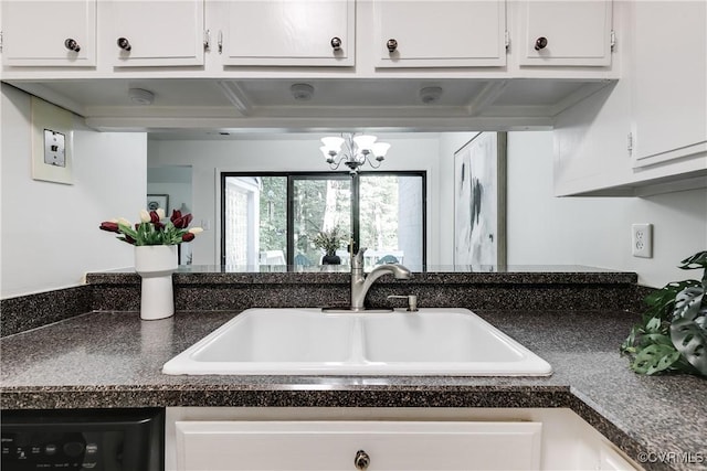 4814 Long Shadow Dr, Chesterfield, VA 23112 - kitchen with dark countertops, white cabinetry, and a chandelier