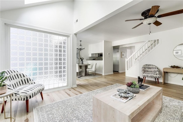 4814 Long Shadow Dr, Chesterfield, VA 23112 - living room featuring wood finished floors, a ceiling fan, and stairs