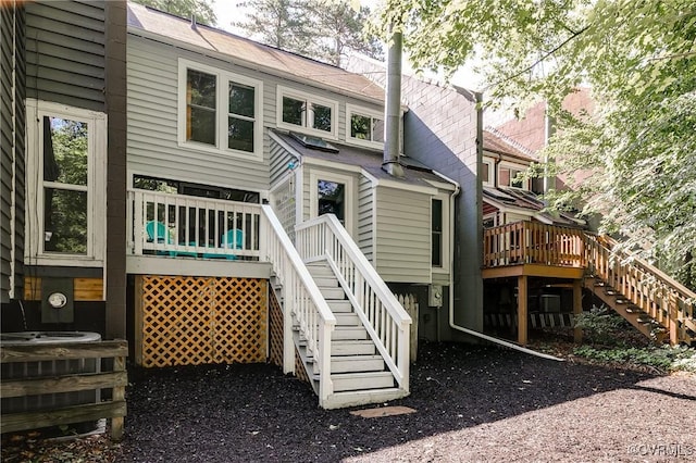4814 Long Shadow Dr, Chesterfield, VA 23112 - back of property featuring stairs and a wooden deck
