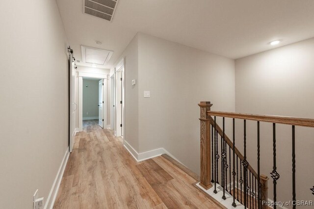 117 Meeting Pl, Williamsburg, VA 23185 - corridor featuring light wood-style floors, an upstairs landing, and attic access