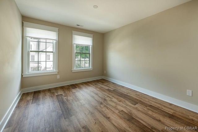 117 Meeting Pl, Williamsburg, VA 23185 - unfurnished room with wood finished floors and baseboards