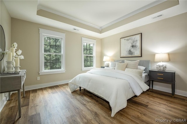 117 Meeting Pl, Williamsburg, VA 23185 - bedroom with a raised ceiling and wood finished floors
