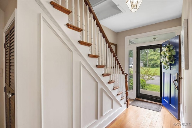 429 4th St, West Point, VA 23181 - foyer entrance featuring light wood-type flooring and stairs