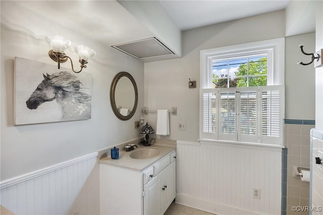 429 4th St, West Point, VA 23181 - bathroom featuring wainscoting and vanity