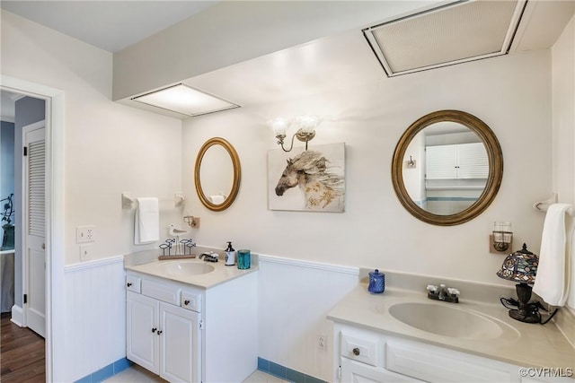 429 4th St, West Point, VA 23181 - full bath with wainscoting and two vanities